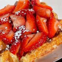 French Toast  · Cinnamon & sugar with egg baked into the dough with strawberries, whipped cream and syrup.