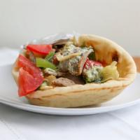 Gyro Sandwich · Wrap gyro. Gyro meat wrapped in pita bread with tomatoes, lettuce, cucumbers, and tzatziki s...