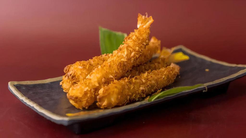 Coconut Shrimps · 5 pieces of shrimp dipped in batter and rolled in an aromatic blend of shredded coconut and panko breadcrumbs served with thai dash’s sweet sauce. A crispy, fried appetizer that is so delicious.