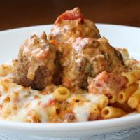 Rigatoni Bolognese · Rigatoni with bolognese sauce topped with parmesan and crispy breadcrumbs