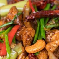 Pad Cashew · Stir fried choice of meat with chili paste, bell peppers, carrot, cashew nuts, onions, and g...