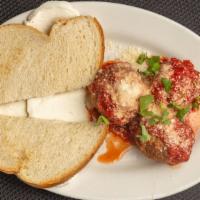 Meatballs · Three meatballs, marinara and garlic toast.