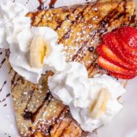 Crepe · Crepe filled with Nutella and strawberries topped with whipped cream. Add ice cream for an e...
