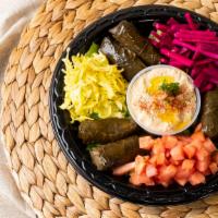 Grape Leaves (6 Piece) (Full Order) · Stuffed with rice, onions, spices, and served with hummus.