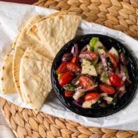 Tomato & Cucumber Salad · Diced tomatoes and chopped cucumber, onions, and olives mixed with Sultan's seasonings and v...