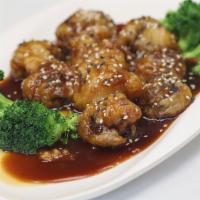 Sesame Chicken · Soy protein or fried mushroom, broccoli, sesame seeds.