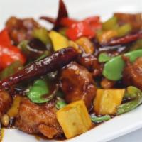 Kung Pao Chicken · Soy-chicken, yellow squash, bell peppers, dried peppers, peanuts, snow peas.