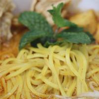 Curry Noodle · Yellow wheat noodle, bean sprouts, tofu, mint leaf, fried bean curd.