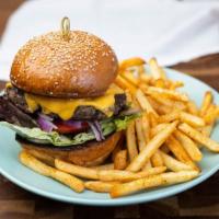 Classic Burger · 8 oz patty made from brisket, sirloin and 80/20 angus on a challah sesame seed bun with lett...