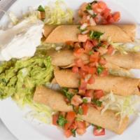 Chicken Taquitos · Four fried rolled taquitos. Served with a side of lettuce, pico de gallo, sour cream, and gu...