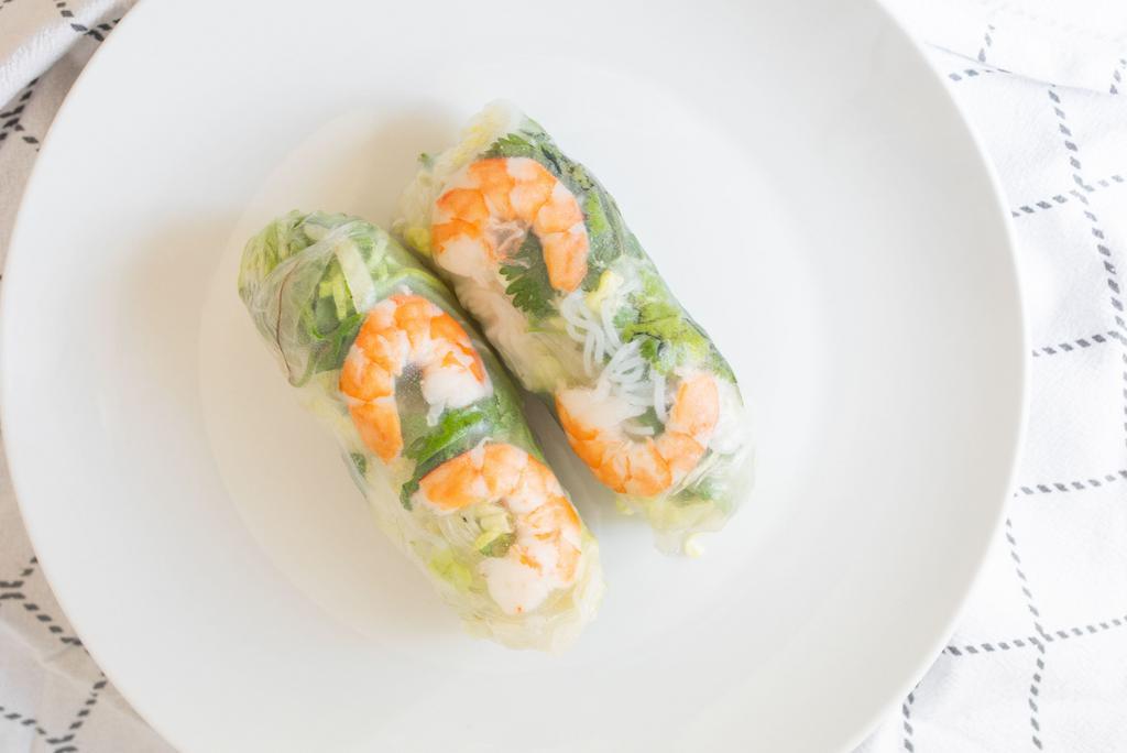 Fresh Spring Roll (2 Pcs.) · Thin rice paper wrapped with lettuce, rice noodle, cucumber, fried tofu, and cilantro.
