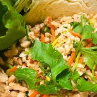 Larb Salad (Pork Or Chicken)  · Ground meat mixed with rice powder, lime juice, onion, and chili powder. Topped with cilantr...
