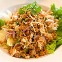 Crispy Rice  · Ground chicken, spicy rice, red onion, green onion, tossed with lime juice and fish sauce on...