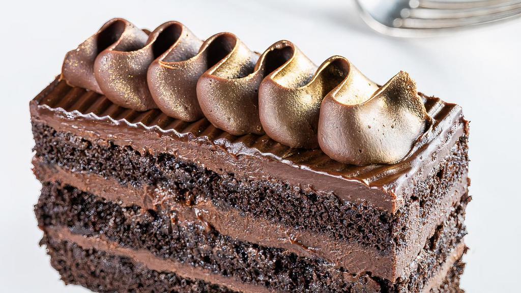 Dream Dark Chocolate · A big bite of rich chocolate layered cake under a creamy chocolate and ganache.