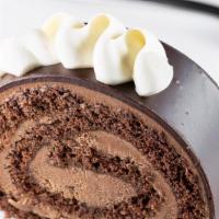 Chocolate Almond Rolled Cake  · Our take on a chocolate swiss roll, with delicious almond and chocolate whipped cream frosti...