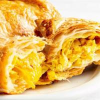 Paneer Puff · Paneer cheese, onions, and mild spice, wrapped and baked in buttery puff pastry!