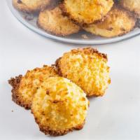 Coconut Macaroons · Our signature coconut macaroons crispy on the outside and chewy in the center for a decadent...