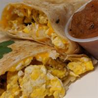 Egg And Cheese Burrito · Flour tortilla filled with eggs and Mexican cheese blend, comes with choice of green or red ...