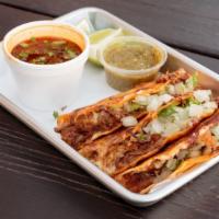 Red  Birria Quesataco · tortilla filled with melted cheese and beef birria (price per taco comes with consome)