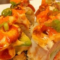 On - Fire · Krab mix topped with avocado, hamachi, tuna, spicy mayo, siracha. The fish on top is torched.