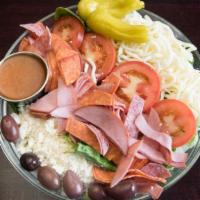 Antipasto Salad · A mountain of greens, assorted cold meats, salami, pepperoni, ham, greek olives, pepperoncin...