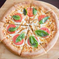 Margherita Pizza · Garlic, basil, mozzarella, parmesan cheeses, and sliced tomatoes on top with olive oil base.