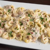 Soprano'S Special Pasta · Cheese filled tortellini, bacon, mushrooms, homemade alfredo sauce, and parmesan. Served wit...