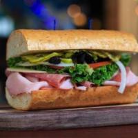 East Side Italian Sandwich · Boars Head ham, salami and turkey with provolone, topped with lettuce, tomato, onion, pickle...