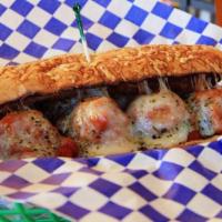 Meatball Pamesan Sandwich · Seasoned ground beef meatballs in our very own marinara toasted with Parmesan and mozzarella...