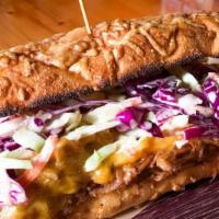 Pulled Pork Sandwich · In the house, slow smoked and shredded pork, marinated in a blend of bbq and other delicious...