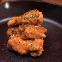Chicken Wings · Perfectly Baked Wings Served w/ Your Choice of Sauce.