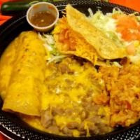 Taco Enchilada Special · One taco, one enchilada, beans, rice, salad, tortilla. Or two tacos, or two enchiladas.
