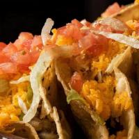 Tacos · Shredded beef, chicken, fish, carne asada or papas con carne.