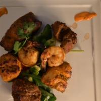 Zaika Mixed Grill-D · Gluten free. An assortment of shrimp, chicken, fish, and lamb in a yogurt-ginger-garlic mari...