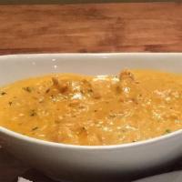 Chicken Korma · Gluten Free. Chicken morsels cooked with nuts and light cream sauce.