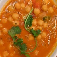 Chana Masala-D · Vegan and Gluten Free. Chickpeas cooked in a traditional onion-tomato sauce.