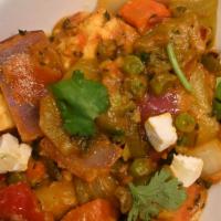 Vegetable Krahi-D · Gluten free. Vegetables and house-made cheese sautéed with onions and bell peppers.