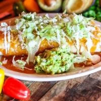 Pueblo Burritos · Large flour tortilla filled with Mexican rice, refried beans, mixed shredded cheese and roll...