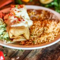 Chimichanga Puerto Vallarta · Heat things up with our seafood chimichanga. A flour tortilla filled with shredded cheese, s...