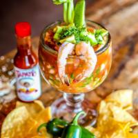 Coctail De Camaron · New. Gluten-free. Mexican style shrimp cocktail made with clamato juice, ketchup, chopped to...