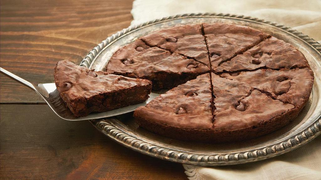 Pizza Brownie · Try our NEW Pizza Dessert and choose either Brownie or a Chocolate Chip Cookie. It’s sooo good.