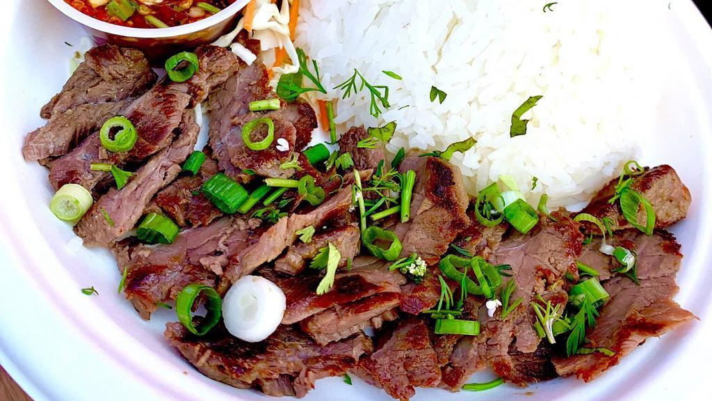 Waterfall Beef · Grilled marinated steak served w/jasmine rice and a side of jeow som dipping sauce.