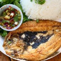 Pan Fried Milkfish · Crisp & lightly fried milkfish served with jeow som & Jasmine Rice
