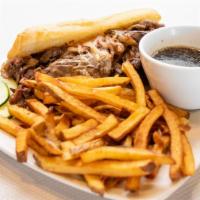 Prime Rib Dip Sandwich · Thinly sliced ribeye, Swiss, grilled onions, served with au jus.