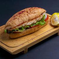 Deep Fried Catfish · Deep fried munchie seasoned catfish fillet plus lettuce, tomatoes and onion than add the tar...