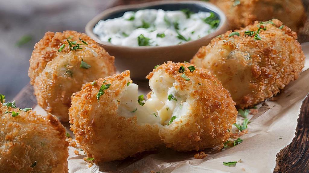 Deep Fried Potato Round · House cut round potatoes coated in batter than deep fried!