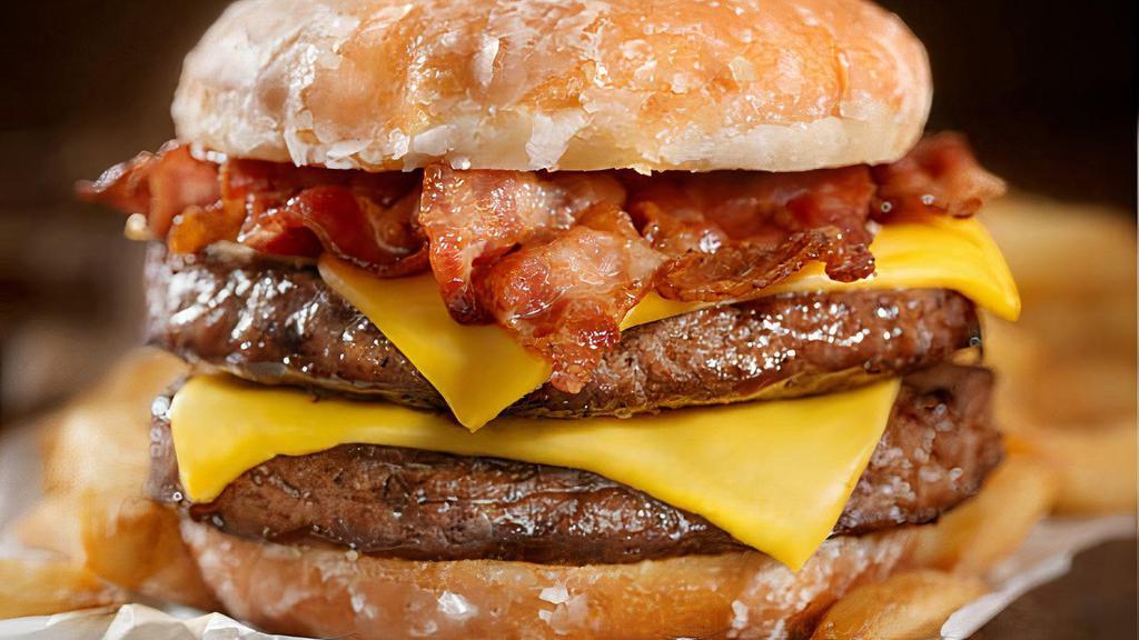 Munchies Overload Burger · Four Munchie seasoned real beef patties with four pieces of bacon and double the cheese!