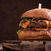 Classic Hamburger · Two beef patties onions plus ketchup an Mustard!