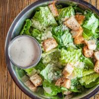 Caesar Salad · Smoked chicken breast, romaine lettuce, croutons and Parmesan cheese tossed with a Caesar dr...