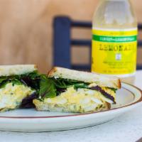 Egg Sandwich · Hard boiled eggs, smoked, then mixed with celery and red onion served with spring mix.